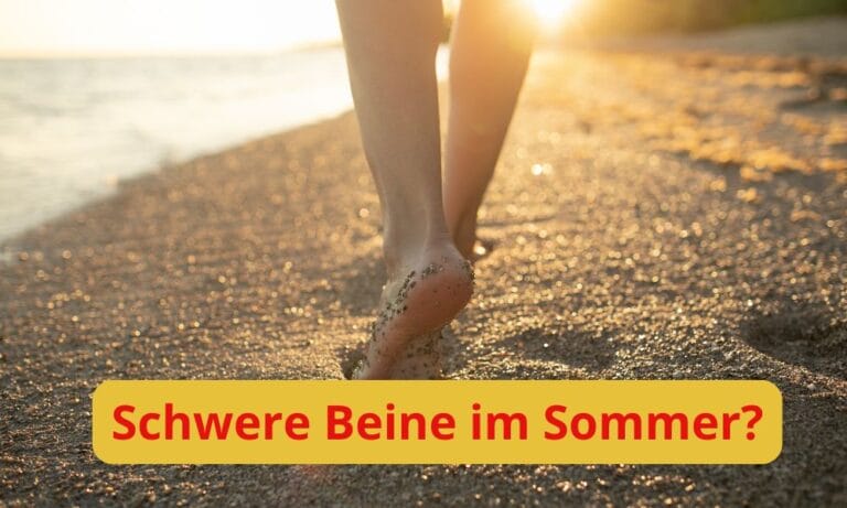 Frauenbeine am Strand